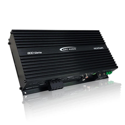 Black audio amplifier with 'Arc Audio' branding on a white background