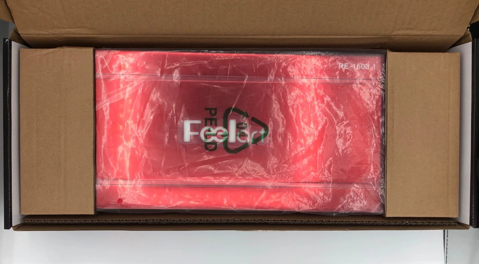 Red product in a cardboard box with 'Feelfree' branding.