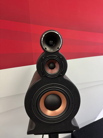 Speaker with a red and white background