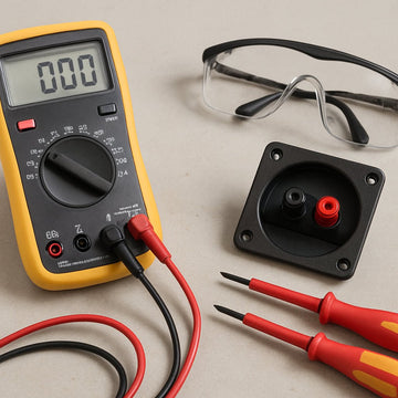 A close‑up of a car audio technician’s bench with a digital multimeter, insulated screwdrivers, safety glasses, and a subwoofer terminal ready for testing. Alt: Gather tools and safety precautions for testing a subwoofer with a multimeter.
