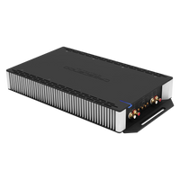 Black amplifier with gold and red connectors on a white background