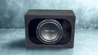 Subwoofer in a black enclosure on a gray background