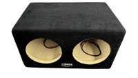 Black double-subwoofer enclosure with visible brand name on a white background