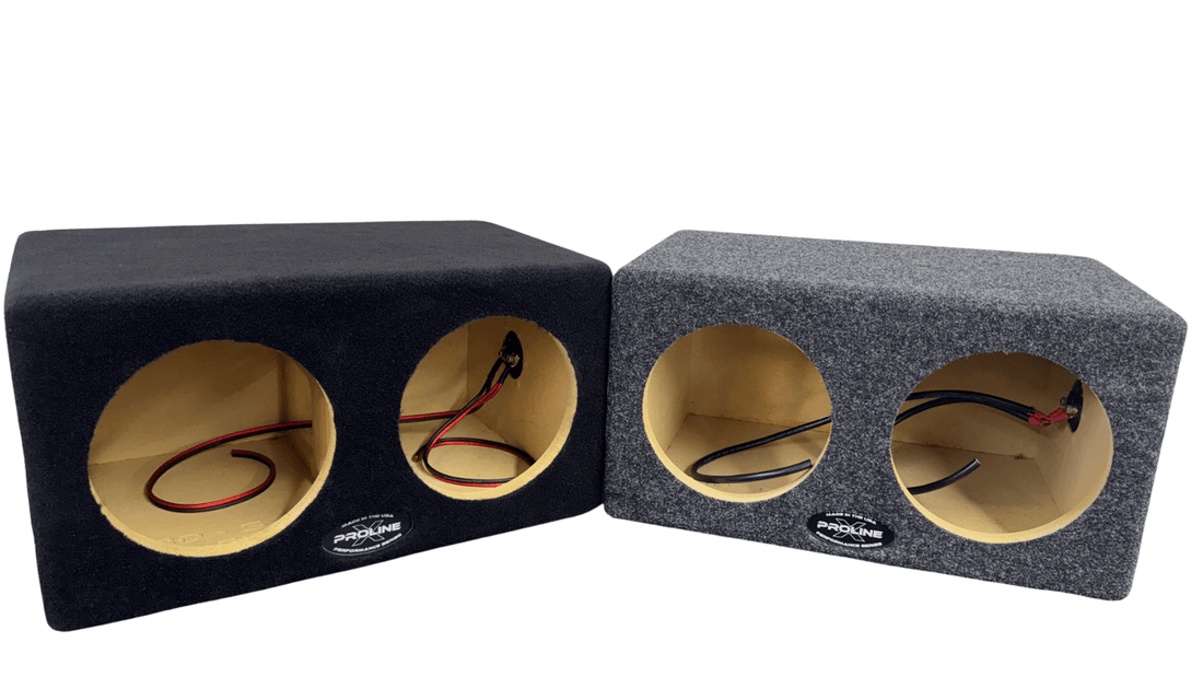 Two car audio subwoofer enclosures on a white background