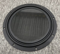 Stereo Integrity BM-11 11 inch shallow subwoofer, front view of the flat carbon fiber diaphragm and surround