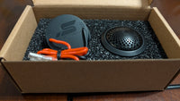 Stereo Integrity M22 tweeter pair in the box, one turned to show the rear leads